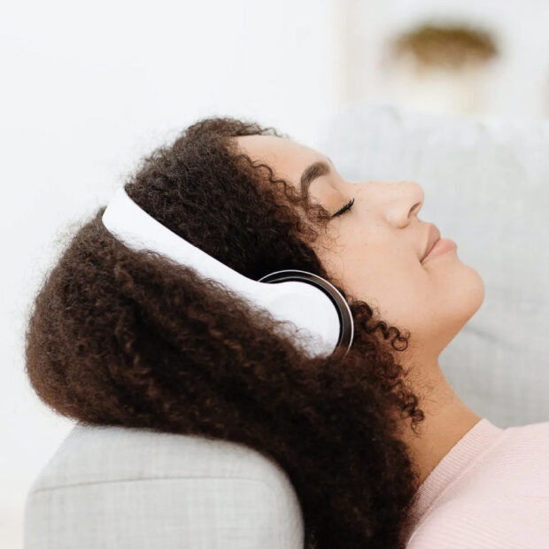 person with headphones on relaxing